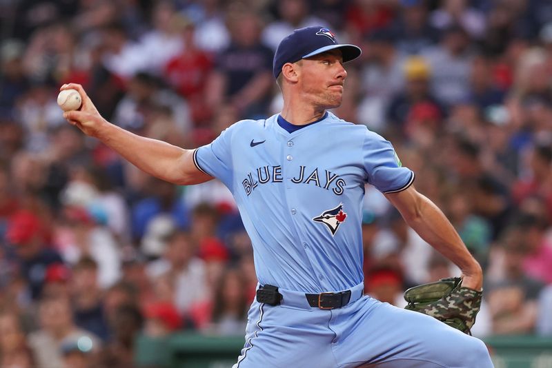 Jun 24, 2024; Boston, Massachusetts, USA; Toronto Blue Jays starting pitcher Chris Bassitt (40) throws a pitch during the second inning against the Boston Red Sox at Fenway Park. Mandatory Credit: Paul Rutherford-USA TODAY Sports