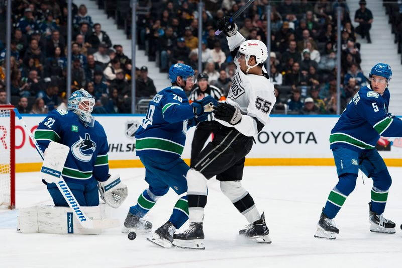 Los Angeles Kings turn faceoff dots into a runway past the Vancouver Canucks at Rogers Arena