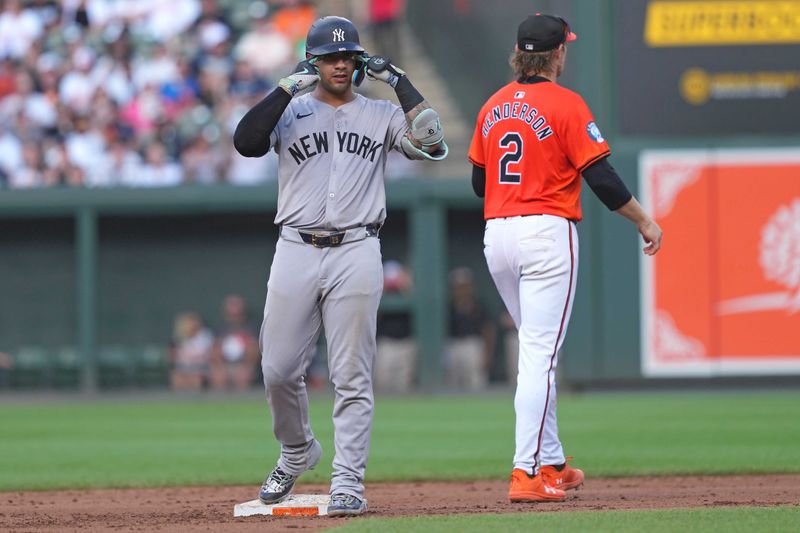 Jul 13, 2024; Baltimore, Maryland, USA; New York Yankees second baseman Gleyber Torres (25) gestures following his double in the fifth inning against the Baltimore Orioles at Oriole Park at Camden Yards. Mandatory Credit: Mitch Stringer-USA TODAY Sports