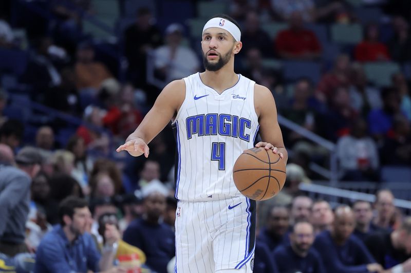 NEW ORLEANS, LOUISIANA - APRIL 03: Jalen Suggs #4 of the Orlando Magic drives with the ball against the New Orleans Pelicans during a game at the Smoothie King Center on April 03, 2024 in New Orleans, Louisiana. NOTE TO USER: User expressly acknowledges and agrees that, by downloading and or using this Photograph, user is consenting to the terms and conditions of the Getty Images License Agreement. (Photo by Jonathan Bachman/Getty Images)