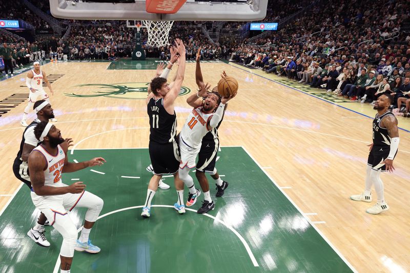 MILWAUKEE, WI - APRIL 7: Jalen Brunson #11 of the New York Knicks shoots the ball during the game against the Milwaukee Bucks on April 7, 2024 at the Fiserv Forum Center in Milwaukee, Wisconsin. NOTE TO USER: User expressly acknowledges and agrees that, by downloading and or using this Photograph, user is consenting to the terms and conditions of the Getty Images License Agreement. Mandatory Copyright Notice: Copyright 2024 NBAE (Photo by Jeff Haynes/NBAE via Getty Images).