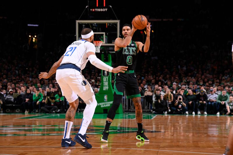 BOSTON, MA - MARCH 1: Jayson Tatum #0 of the Boston Celtics passes the ball during the game against the Dallas Mavericks on March 1, 2024 at the TD Garden in Boston, Massachusetts. NOTE TO USER: User expressly acknowledges and agrees that, by downloading and or using this photograph, User is consenting to the terms and conditions of the Getty Images License Agreement. Mandatory Copyright Notice: Copyright 2024 NBAE  (Photo by Brian Babineau/NBAE via Getty Images)