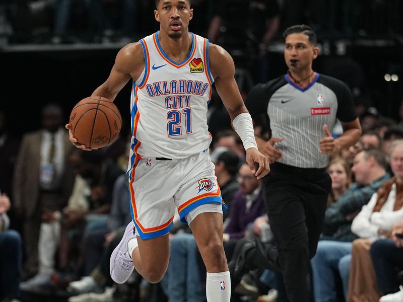 DALLAS, TX - JANUARY 17:  Aaron Wiggins #21 of the Oklahoma City Thunder dribbles the ball during the game against the Dallas Mavericks on January 17, 2025 at American Airlines Center in Dallas, Texas. NOTE TO USER: User expressly acknowledges and agrees that, by downloading and or using this photograph, User is consenting to the terms and conditions of the Getty Images License Agreement. Mandatory Copyright Notice: Copyright 2025 NBAE (Photo by Glenn James/NBAE via Getty Images)