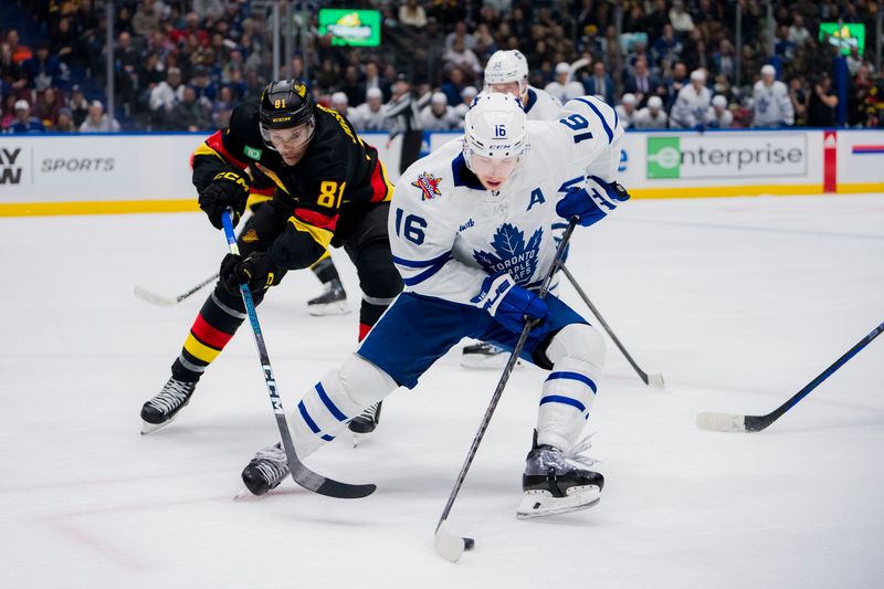 Jan 20, 2024; Vancouver, British Columbia, CAN; Vancouver Canucks forward Dakota Joshua (81) stick checks Toronto Maple Leafs forward Mitchell Marner (16) in the second period at Rogers Arena. Mandatory Credit: Bob Frid-USA TODAY Sports