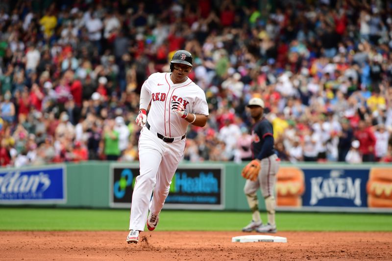 May 18, 2025; Boston, Massachusetts, USA; Boston Red Sox designated hitter Rafael Devers (11) rounds the bases after hitting a grand slam during the third inning against the Atlanta Braves at Fenway Park. Mandatory Credit: Bob DeChiara-Imagn Images