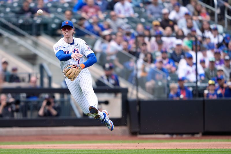 Jun 1, 2025; New York City, New York, USA; New York Mets third baseman Brett Baty (7) throws out Colorado Rockies left fielder Jordan Beck (27) (not pictured) after fielding a ground ball during the third inning at Citi Field. Mandatory Credit: Gregory Fisher-Imagn Images