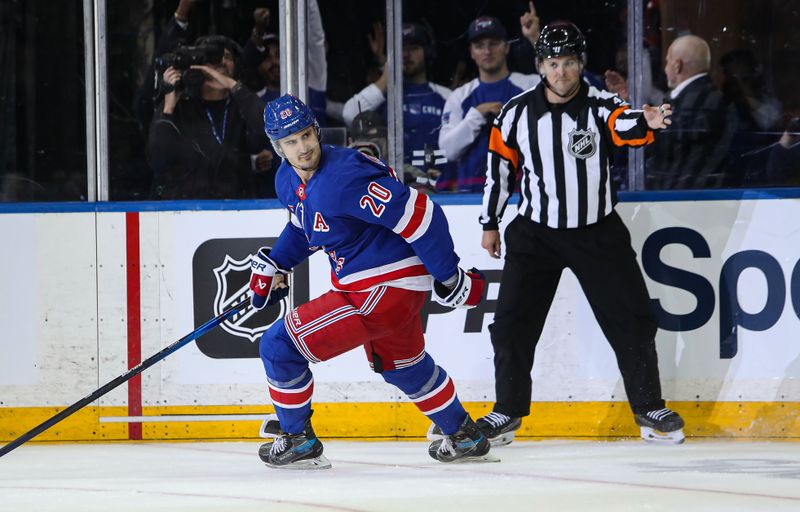 Sep 24, 2024; New York, New York, USA; New York Rangers left wing Chris Kreider (20) reacts to an empty-net goal against the New York Islanders during the third period at Madison Square Garden. Mandatory Credit: Danny Wild-Imagn Images