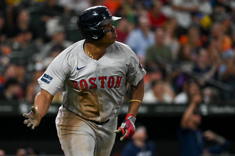 Aug 16, 2024; Baltimore, Maryland, USA; Boston Red Sox third baseman Rafael Devers (11) runs out a third inning two run home run against the Baltimore Orioles  at Oriole Park at Camden Yards. Mandatory Credit: Tommy Gilligan-USA TODAY Sports