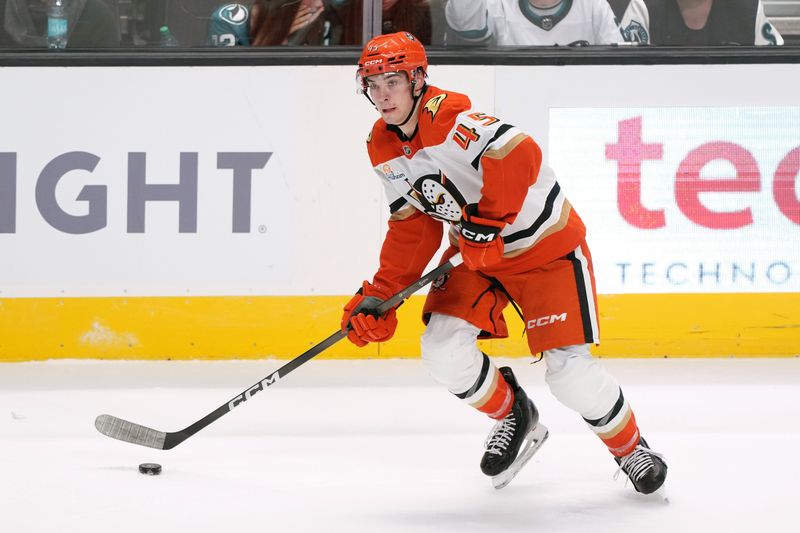 Oct 11, 2025; San Jose, California, USA; Anaheim Ducks right wing Beckett Sennecke (45) handles the puck during the third period against the San Jose Sharks at SAP Center at San Jose. Mandatory Credit: Darren Yamashita-Imagn Images