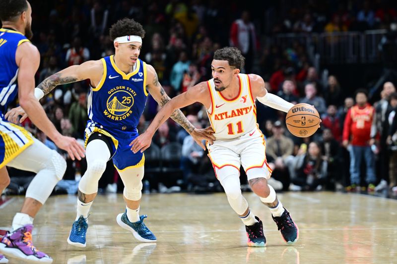 ATLANTA, GA - FEBRUARY 3: Trae Young #11 of the Atlanta Hawks handles the ball during the game  against the Golden State Warriors on February 3, 2024 at State Farm Arena in Atlanta, Georgia.  NOTE TO USER: User expressly acknowledges and agrees that, by downloading and/or using this Photograph, user is consenting to the terms and conditions of the Getty Images License Agreement. Mandatory Copyright Notice: Copyright 2024 NBAE (Photo by Adam Hagy/NBAE via Getty Images)