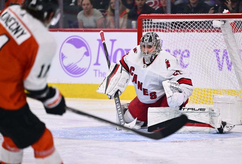 Nov 28, 2023; Philadelphia, Pennsylvania, USA; Carolina Hurricanes goalie Pyotr Kochetkov (52) defends the net against the Philadelphia Flyers in the second period at Wells Fargo Center. Mandatory Credit: Kyle Ross-USA TODAY Sports