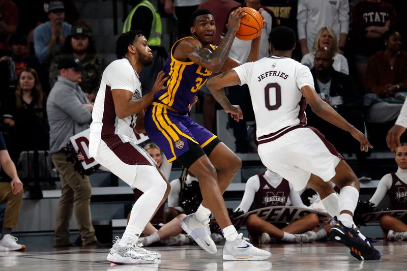 Feb 8, 2023; Starkville, Mississippi, USA; LSU Tigers forward Shawn Phillips Jr. (34) makes a play as Mississippi State Bulldogs forward Will McNair Jr. (13) and forward D.J. Jeffries (0) defend during the first half at Humphrey Coliseum. Mandatory Credit: Petre Thomas-USA TODAY Sports