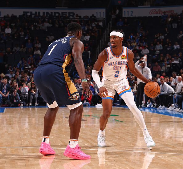 OKLAHOMA CITY, OK - NOVEMBER 1:  Shai Gilgeous-Alexander #2 of the Oklahoma City Thunder handles the ball during the game against the New Orleans Pelicans on November 1, 2023 at Paycom Arena in Oklahoma City, Oklahoma. NOTE TO USER: User expressly acknowledges and agrees that, by downloading and or using this photograph, User is consenting to the terms and conditions of the Getty Images License Agreement. Mandatory Copyright Notice: Copyright 2023 NBAE (Photo by Zach Beeker/NBAE via Getty Images)