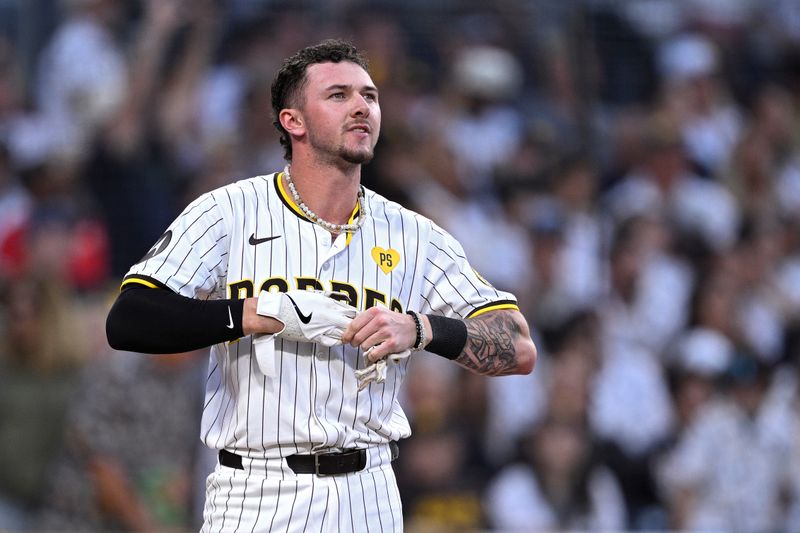 Jun 20, 2024; San Diego, California, USA; San Diego Padres center fielder Jackson Merrill (3) looks on after striking out to end the third inning against the Milwaukee Brewers at Petco Park. Mandatory Credit: Orlando Ramirez-USA TODAY Sports