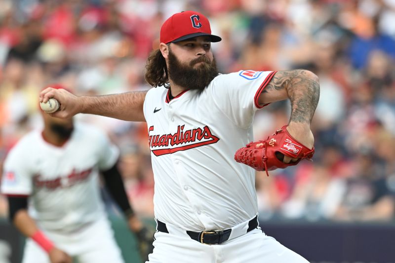 Jun 7, 2025; Cleveland, Ohio, USA; Cleveland Guardians relief pitcher Hunter Gaddis (33) throws a pitch during the tenth inning against the Houston Astros at Progressive Field. Mandatory Credit: Ken Blaze-Imagn Images