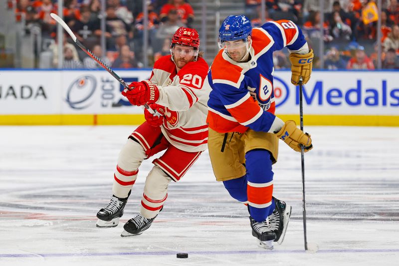 Feb 24, 2024; Edmonton, Alberta, CAN; Edmonton Oilers defensemen Evan Bouchard (2) moves the puck in front of  Calgary Flames forward Blake Coleman (20) during the second period at Rogers Place. Mandatory Credit: Perry Nelson-USA TODAY Sports