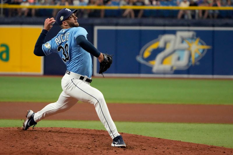 Apr 2, 2023; St. Petersburg, Florida, USA; Tampa Bay Rays relief pitcher Colin Poche (38) throws a pitch against the Detroit Tigers during the seventh inning at Tropicana Field. Mandatory Credit: Dave Nelson-USA TODAY Sports