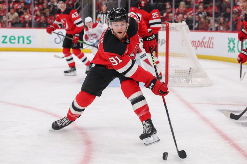 Nov 6, 2025; Newark, New Jersey, USA; New Jersey Devils center Dawson Mercer (91) plays the puck against the Montréal Canadiens during the first period at Prudential Center. Mandatory Credit: Ed Mulholland-Imagn Images Nov 6, 2025; Newark, New Jersey, USA; New Jersey Devils center Dawson Mercer (91) plays the puck against the Montréal Canadiens during the first period at Prudential Center. Mandatory Credit: Ed Mulholland-Imagn Images