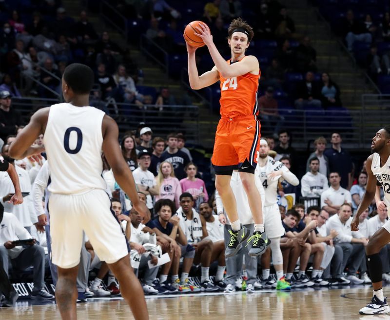 Feb 14, 2023; University Park, Pennsylvania, USA; Illinois Fighting Illini guard/forward Matthew Mayer (24) jumps for the loose ball during the second half against the Penn State Nittany Lions at Bryce Jordan Center. Penn State defeated Illinois 93-81. Mandatory Credit: Matthew OHaren-USA TODAY Sports