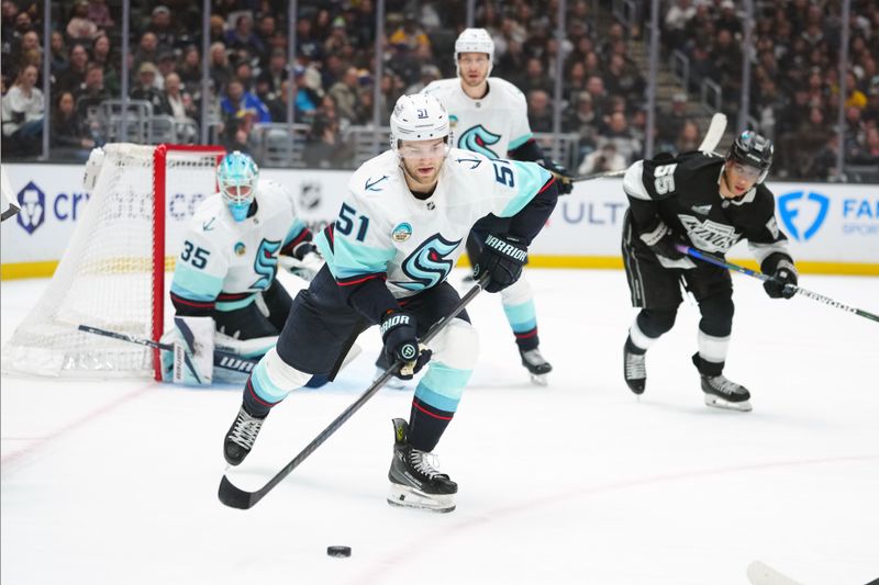 Dec 23, 2025; Los Angeles, California, USA; Seattle Kraken center Shane Wright (51) skates with the puck against the LA Kings in the second period at Crypto.com Arena. Mandatory Credit: Kirby Lee-Imagn Images