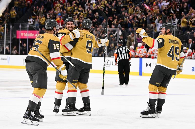 Oct 28, 2024; Las Vegas, Nevada, USA; Vegas Golden Knights right wing Mark Stone (61) celebrates his goal with center Jack Eichel (9), defenseman Noah Hanifin (15), and center Ivan Barbashev (49) against the Calgary Flames in the second period at T-Mobile Arena. Mandatory Credit: Candice Ward-Imagn Images