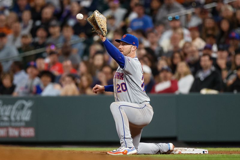 May 26, 2023; Denver, Colorado, USA; New York Mets first baseman Pete Alonso (20) fields a throw at first for an out in the sixth inning against the Colorado Rockies at Coors Field. Mandatory Credit: Isaiah J. Downing-USA TODAY Sports