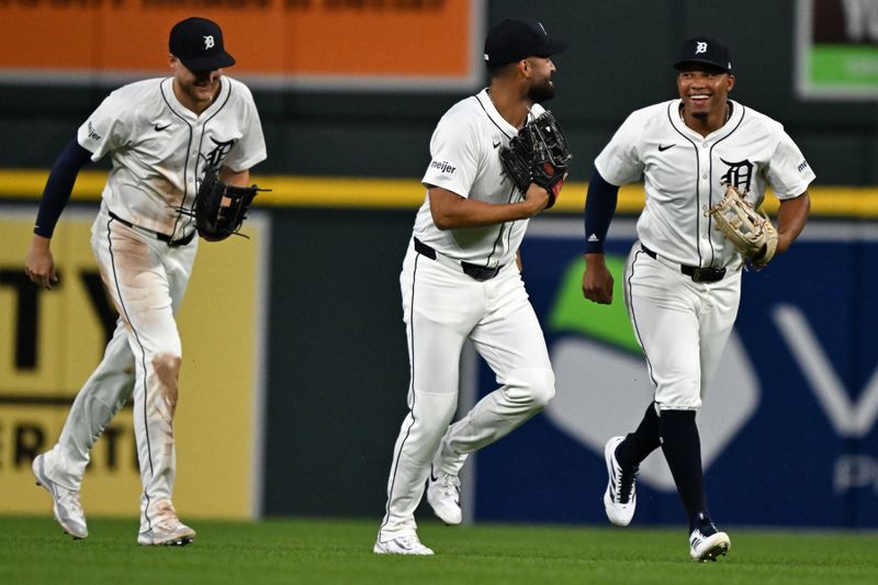 Jun 29, 2025; Detroit, Michigan, USA; Detroit Tigers outfielders, Parker Meadows (left) Riley Greene (center) and Wenceel Pérez (right) celebrate after defeating the Minnesota Twins at Comerica Park. Mandatory Credit: Lon Horwedel-Imagn Images