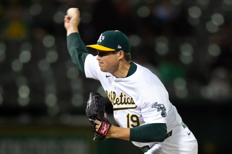 Jun 5, 2024; Oakland, California, USA; Oakland Athletics pitcher Mason Miller (19) delivers a pitch against the Seattle Mariners during the ninth inning at Oakland-Alameda County Coliseum. Mandatory Credit: D. Ross Cameron-USA TODAY Sports