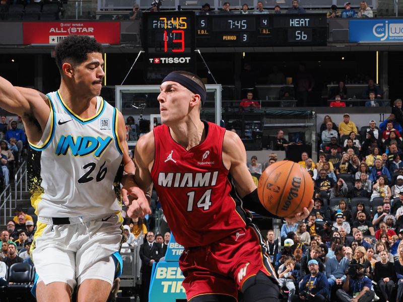 INDIANAPOLIS, IN - NOVEMBER 17: Tyler Herro #14 of the Miami Heat drives to the basket during the game against the Indiana Pacers on November 17, 2024 at Gainbridge Fieldhouse in Indianapolis, Indiana. NOTE TO USER: User expressly acknowledges and agrees that, by downloading and or using this Photograph, user is consenting to the terms and conditions of the Getty Images License Agreement. Mandatory Copyright Notice: Copyright 2024 NBAE (Photo by Ron Hoskins/NBAE via Getty Images)