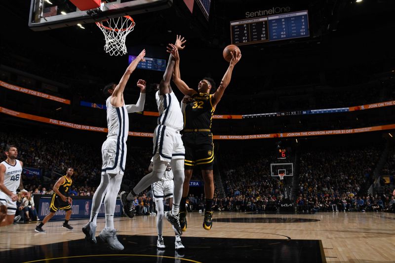 SAN FRANCISCO, CA - MARCH 20: Trayce Jackson-Davis #32 of the Golden State Warriors  drives to the basket during the game against the Memphis Grizzlies on March 20, 2024 at Chase Center in San Francisco, California. NOTE TO USER: User expressly acknowledges and agrees that, by downloading and or using this photograph, user is consenting to the terms and conditions of Getty Images License Agreement. Mandatory Copyright Notice: Copyright 2024 NBAE (Photo by Noah Graham/NBAE via Getty Images)