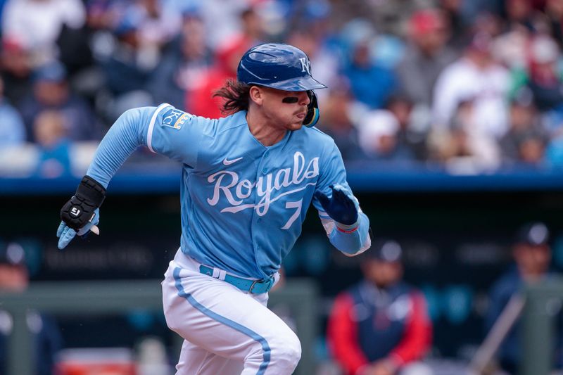 Apr 16, 2023; Kansas City, Missouri, USA; Kansas City Royals shortstop Bobby Witt Jr. (7) heads to first base after a hit during the fourth inning against the Atlanta Braves at Kauffman Stadium. Mandatory Credit: William Purnell-USA TODAY Sports