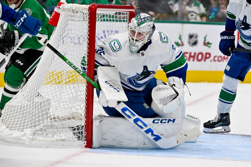 Dec 21, 2023; Dallas, Texas, USA; Vancouver Canucks goaltender Thatcher Demko (35) faces the Dallas Stars attack during the second period at the American Airlines Center. Mandatory Credit: Jerome Miron-USA TODAY Sports