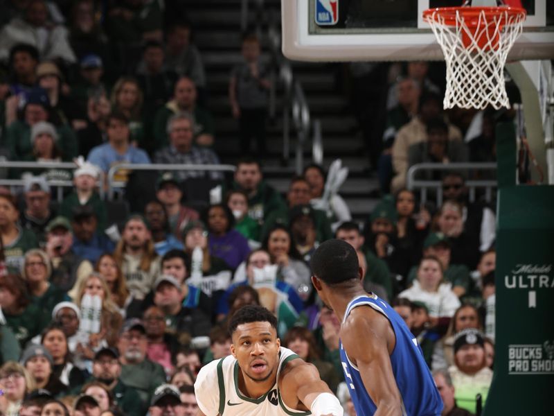 MILWAUKEE, WI - JANUARY 14: Giannis Antetokounmpo #34 of the Milwaukee Bucks plays defense during the game against the Sacramento Kings on January 14, 2024 at the Fiserv Forum Center in Milwaukee, Wisconsin. NOTE TO USER: User expressly acknowledges and agrees that, by downloading and or using this Photograph, user is consenting to the terms and conditions of the Getty Images License Agreement. Mandatory Copyright Notice: Copyright 2024 NBAE (Photo by Gary Dineen/NBAE via Getty Images).