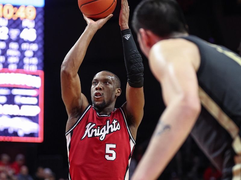 Jan 28, 2024; Piscataway, New Jersey, USA; Rutgers Scarlet Knights forward Aundre Hyatt (5) shoots a free throw in front of Purdue Boilermakers center Zach Edey (15) during the second half at Jersey Mike's Arena. Mandatory Credit: Vincent Carchietta-USA TODAY Sports