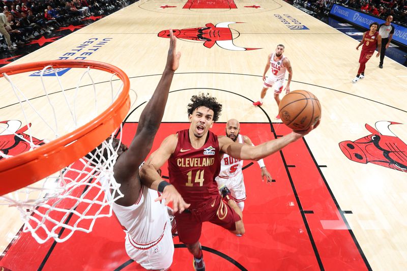 CHICAGO, IL - OCTOBER 18: Jules Bernard #14 of the Cleveland Cavaliers drives to the basket during the game against the Chicago Bulls on October 18, 2024 at United Center in Chicago, Illinois. NOTE TO USER: User expressly acknowledges and agrees that, by downloading and or using this photograph, User is consenting to the terms and conditions of the Getty Images License Agreement. Mandatory Copyright Notice: Copyright 2023 NBAE (Photo by Jeff Haynes/NBAE via Getty Images)