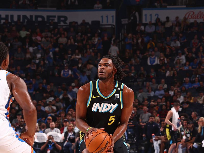 OKLAHOMA CITY, OK - MARCH 12: Jarace Walker #5 of the Indiana Pacers looks on during the game against the Oklahoma City Thunder on March 12, 2024 at Paycom Arena in Oklahoma City, Oklahoma. NOTE TO USER: User expressly acknowledges and agrees that, by downloading and or using this photograph, User is consenting to the terms and conditions of the Getty Images License Agreement. Mandatory Copyright Notice: Copyright 2024 NBAE (Photo by Zach Beeker/NBAE via Getty Images)