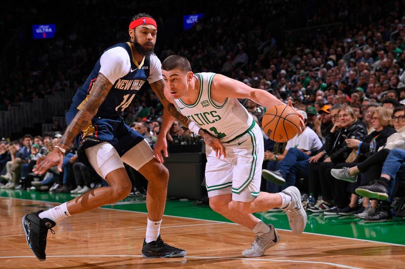 BOSTON, MA - JANUARY 29: Payton Pritchard #11 of the Boston Celtics handles the ball during the game against the New Orleans Pelicans on January 29, 2024 at the TD Garden in Boston, Massachusetts. NOTE TO USER: User expressly acknowledges and agrees that, by downloading and or using this photograph, User is consenting to the terms and conditions of the Getty Images License Agreement. Mandatory Copyright Notice: Copyright 2024 NBAE  (Photo by Brian Babineau/NBAE via Getty Images)