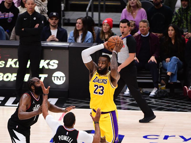 LOS ANGELES, CA - FEBRUARY 28:  LeBron James #23 of the Los Angeles Lakers passes the ball during the game on February 28, 2024 at Crypto.Com Arena in Los Angeles, California. NOTE TO USER: User expressly acknowledges and agrees that, by downloading and/or using this Photograph, user is consenting to the terms and conditions of the Getty Images License Agreement. Mandatory Copyright Notice: Copyright 2024 NBAE (Photo by Adam Pantozzi/NBAE via Getty Images)