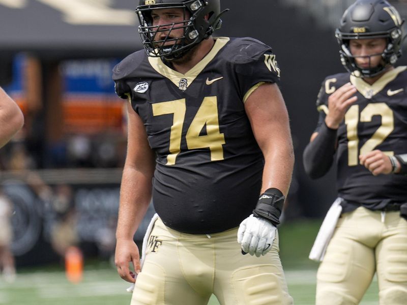 Sep 9, 2023; Winston-Salem, North Carolina, USA; Wake Forest Demon Deacons offensive lineman Luke Petitbon (74) during the second quarter at Allegacy Federal Credit Union Stadium. Mandatory Credit: Jim Dedmon-USA TODAY Sports