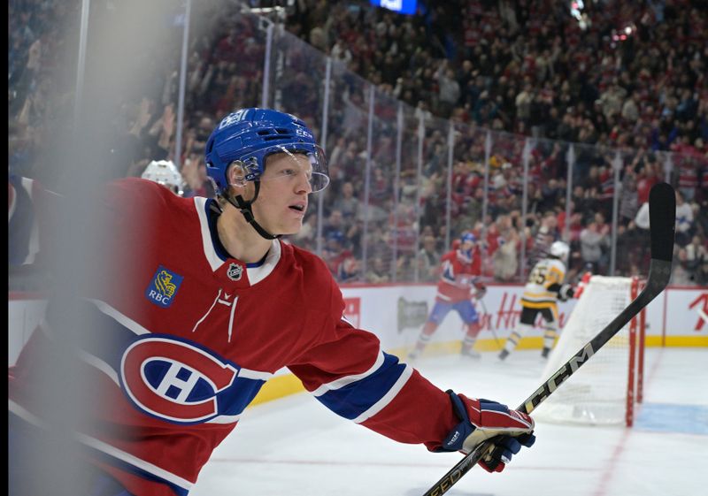 Oct 14, 2024; Montreal, Quebec, CAN; Montreal Canadiens forward Emil Heineman (51) celebrates after scoring a goal against the Pittsburgh Penguins during the second period at the Bell Centre. Mandatory Credit: Eric Bolte-Imagn Images