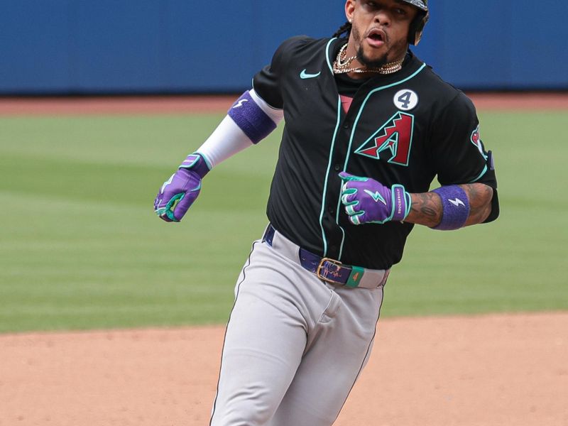 Jun 2, 2024; New York City, New York, USA; Arizona Diamondbacks second baseman Ketel Marte (4) rounds third base after hitting a two run home run during the to of the ninth inning against the New York Mets at Citi Field. Mandatory Credit: Vincent Carchietta-USA TODAY Sports