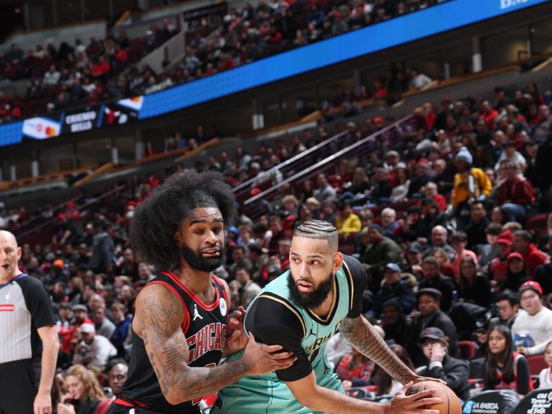 CHICAGO, IL - DECEMBER 13: Cody Martin #11 of the Charlotte Hornets looks to pass the ball during the game against the Chicago Bulls on December 13, 2024 at United Center in Chicago, Illinois. NOTE TO USER: User expressly acknowledges and agrees that, by downloading and or using this photograph, User is consenting to the terms and conditions of the Getty Images License Agreement. Mandatory Copyright Notice: Copyright 2024 NBAE (Photo by Jeff Haynes/NBAE via Getty Images)