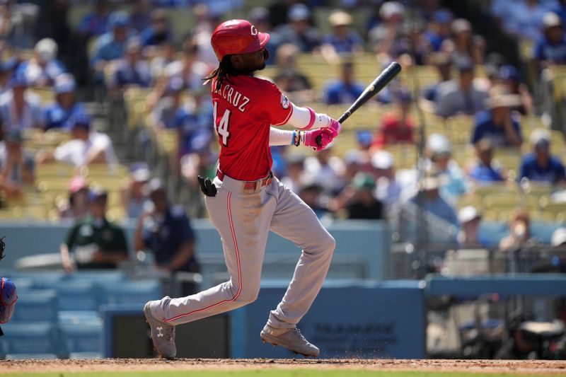 Jul 30, 2023; Los Angeles, California, USA; Cincinnati Reds third baseman Elly De La Cruz (44) singles in the eighth inning against the Los Angeles Dodgers at Dodger Stadium. Mandatory Credit: Kirby Lee-USA TODAY Sports