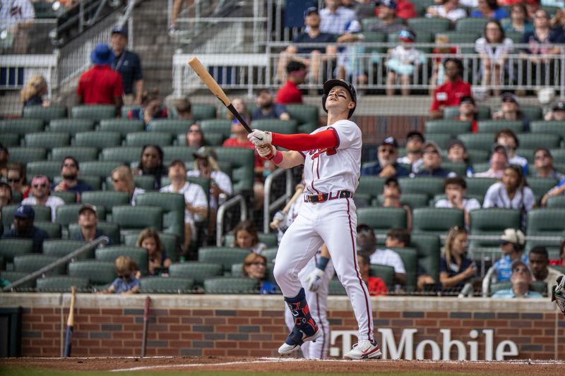 Jun 2, 2024; Cumberland, Georgia, USA; Atlanta Braves outfielder Jarred Kelenic (24) watches fly ball hit against Oakland Athletics during the second inning at Truist Park. Mandatory Credit: Jordan Godfree-USA TODAY Sports