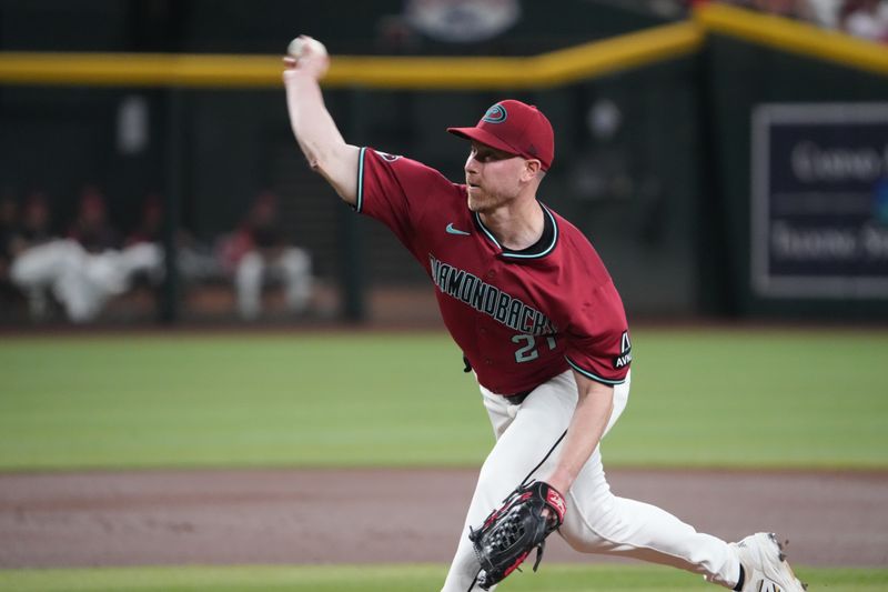 Aug 6, 2025; Phoenix, Arizona, USA; Arizona Diamondbacks pitcher Anthony DeSclafani (21) pitches against the San Diego Padres during the first inning at Chase Field. Mandatory Credit: Joe Camporeale-Imagn Images
