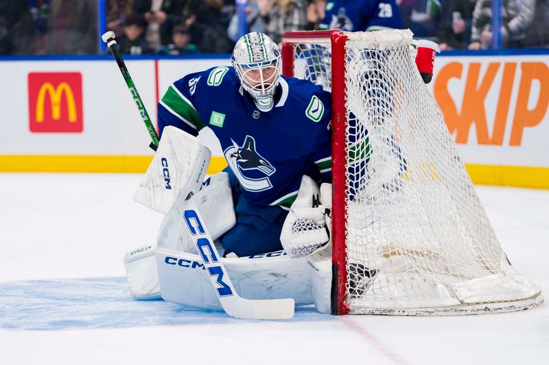 Nov 30, 2023; Vancouver, British Columbia, CAN; Vancouver Canucks goalie Thatcher Demko (35) looks for a shot during warm up prior to a game against the Vegas Golden Knights at Rogers Arena. Mandatory Credit: Bob Frid-USA TODAY Sports