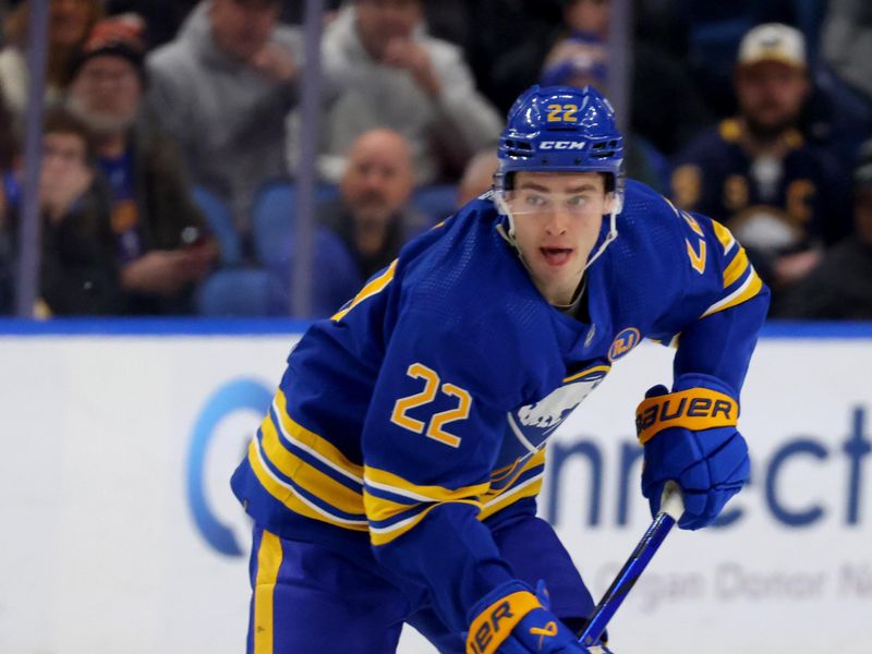 Jan 20, 2024; Buffalo, New York, USA;  Buffalo Sabres right wing Jack Quinn (22) skates up ice with the puck during the second period against the Tampa Bay Lightning at KeyBank Center. Mandatory Credit: Timothy T. Ludwig-USA TODAY Sports