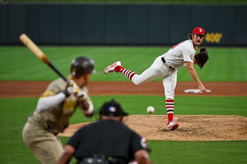 Aug 27, 2024; St. Louis, Missouri, USA;  St. Louis Cardinals starting pitcher Miles Mikolas (39) pitches against San Diego Padres third baseman Manny Machado (13) during the third inning at Busch Stadium. Mandatory Credit: Jeff Curry-USA TODAY Sports