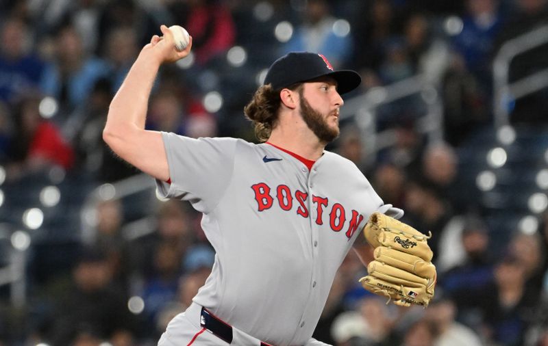 May 1, 2025; Toronto, Ontario, CAN; Boston Red Sox relief pitcher Justin Slaten (63) delivers a pitch against the Toronto Blue Jays in the eighth inning at Rogers Centre. Mandatory Credit: Dan Hamilton-Imagn Images