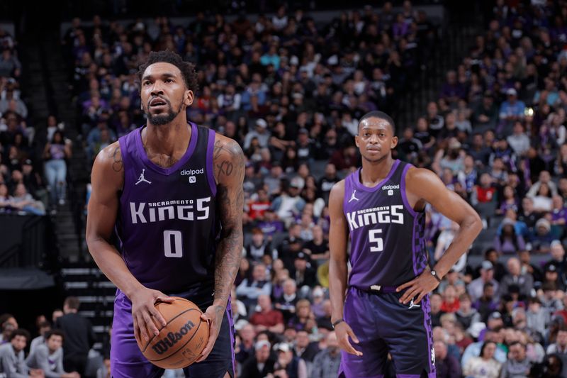 SACRAMENTO, CA - MARCH 12: Malik Monk #0 of the Sacramento Kings shoots a free throw during the game against the Milwaukee Bucks on March 12, 2024 at Golden 1 Center in Sacramento, California. NOTE TO USER: User expressly acknowledges and agrees that, by downloading and or using this Photograph, user is consenting to the terms and conditions of the Getty Images License Agreement. Mandatory Copyright Notice: Copyright 2024 NBAE (Photo by Rocky Widner/NBAE via Getty Images)